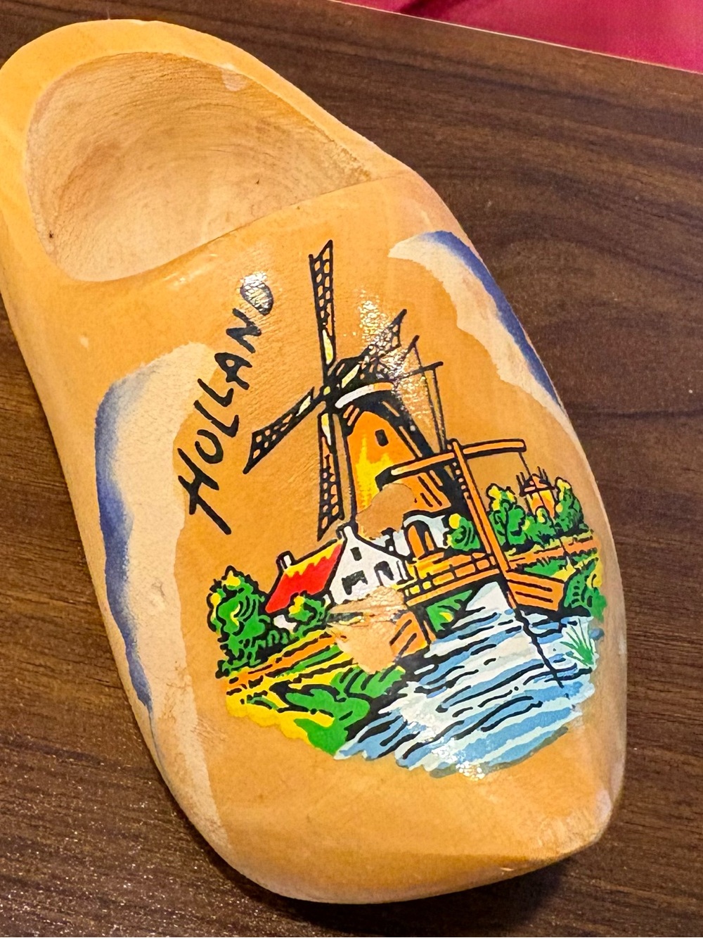 Holland hand painted yellow wooden clog shoe with windmill scene.